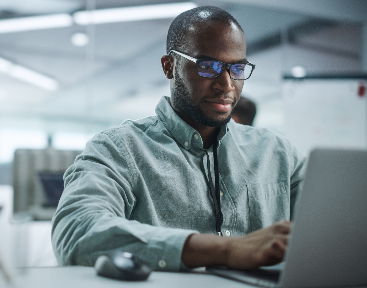 IT Expert working on computer